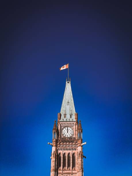 istock Peace tower, an historical landmark surrounded with blue background. 1447315865