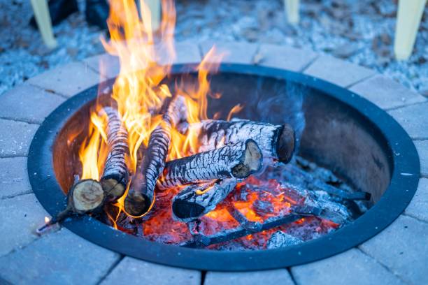 istock Top view of a stone fire pit in a house backyard with blur background 1447316084