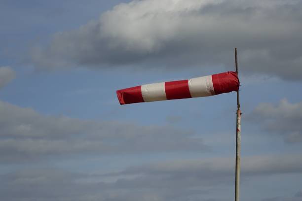 istock Windsock blown by the wind on the field 1447317640