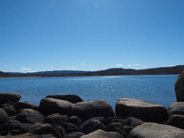 istock Lake with mountains in the background 1447326565