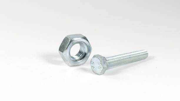 istock Closeup of a nut and bolt on a white background 1447327552