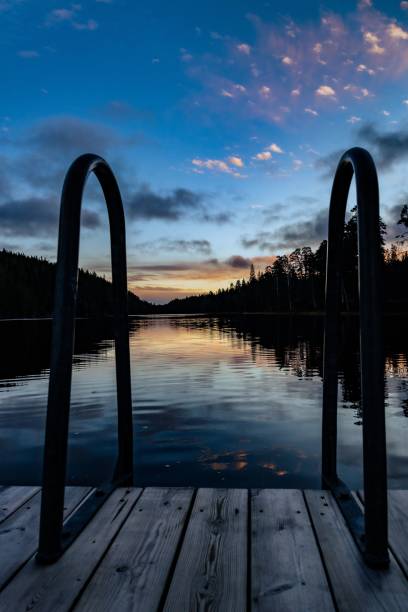 istock Beautiful view of a lake during the sunset 1447329363