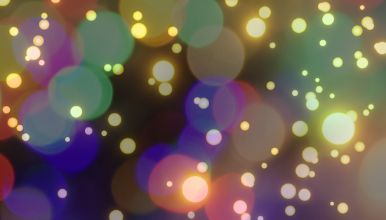 Abstract multi colored bokeh background. Defocused lights background