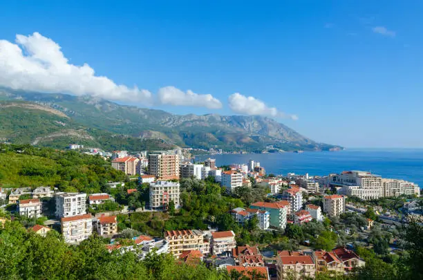 Photo of Beautiful top view of resort town of Becici on coast of Adriatic Sea, Montenegro