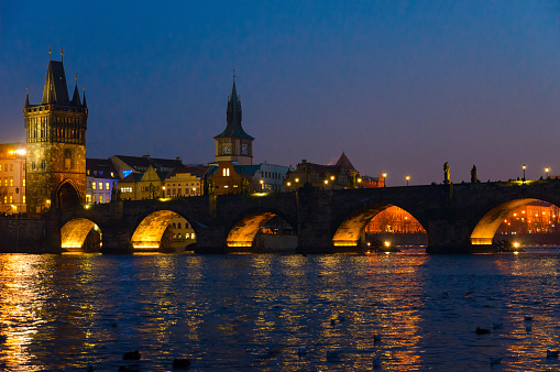 Beautiful evening view of Vltava River and famous medieval Charles Bridge, Prague, Czech Republic