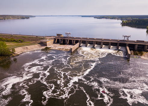 View of river with dam construction and gates near Voronezh, Russia