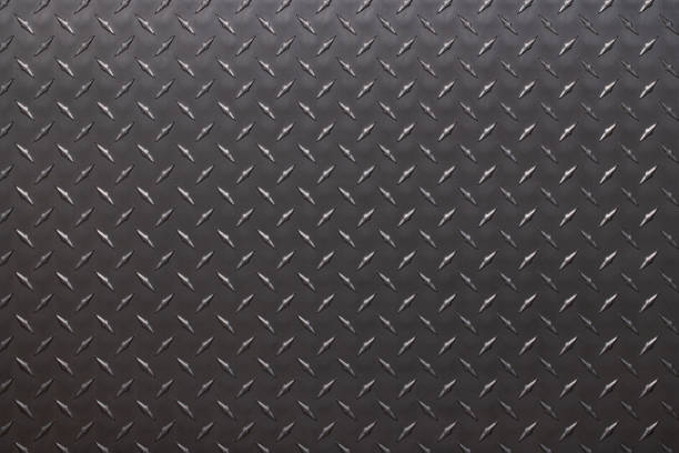istock dark metal background, steel texture with diamond print. 1447341497