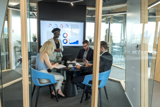 istock Multiracial Team Of Finance Analyzing Together Business Information At The Office 1447347313