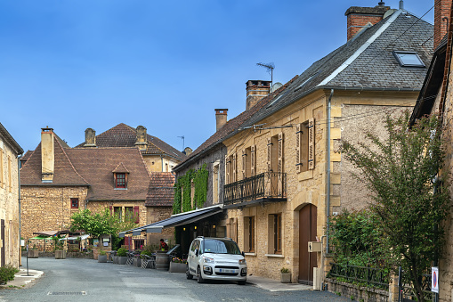 Street with historical houses in Saint-Leon-sur-Vezere, Dordogne,France