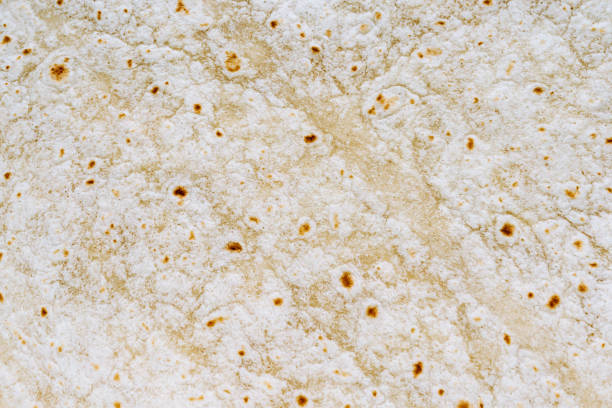 istock Closeup texture of pita bread 1447351109