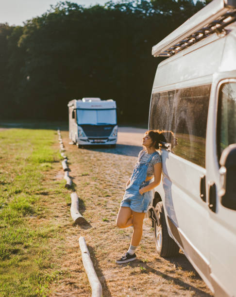 istock Woman near the camper van 1447352682