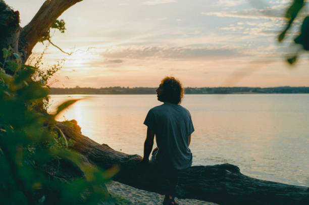 istock Man walking near the sea in Germany 1447355234