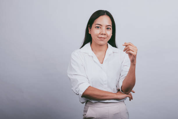 istock Business person portrait in grey background. 1447355513