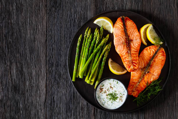 istock roast salmon steaks with asparagus and dill sauce 1447356687
