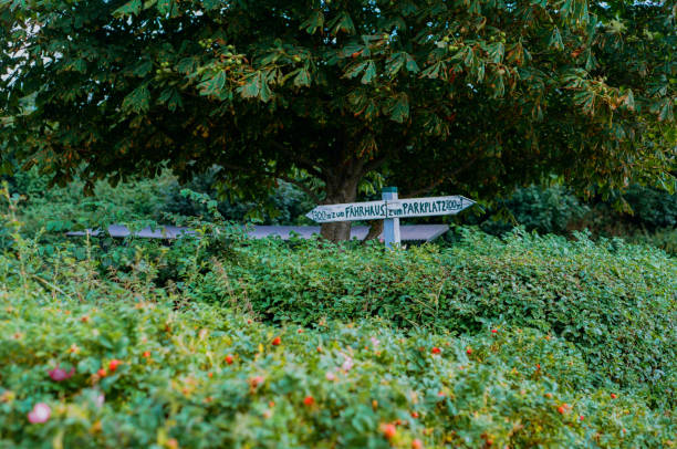 istock Road sign in German in national park 1447356789