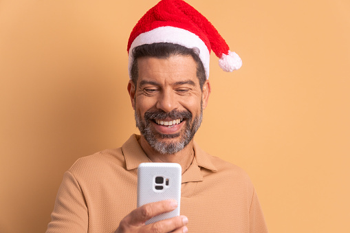 Close up of happy man using mobile app