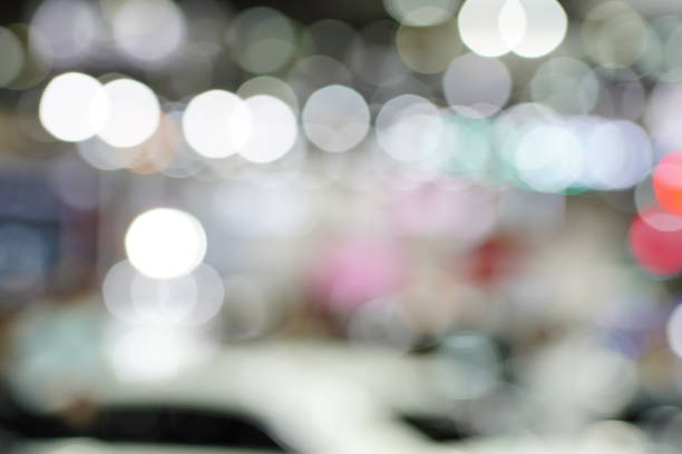 istock Color bokeh light defocused abstract background 1447358081