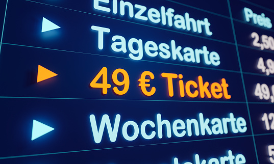 Symbol for the upcoming public transport ticket in Germany. Station monitor for purchasing the 49-Euro ticket.