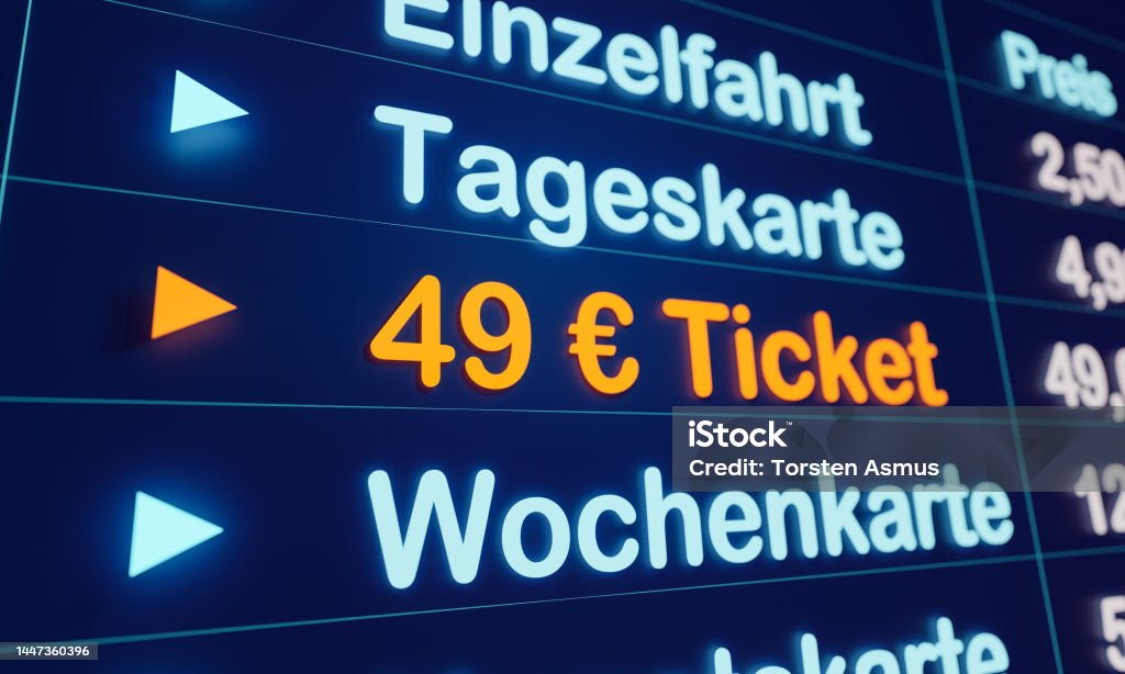 49 Euro ticket for travelers and working people who rely on local public transport. Symbol for the upcoming public transport ticket in Germany. Station monitor for purchasing the 49-Euro ticket. Ticket Stock Photo