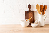 kitchen background for the layout with a copy of the space on a white brick wall. minimalist composition of part of the kitchen countertop.