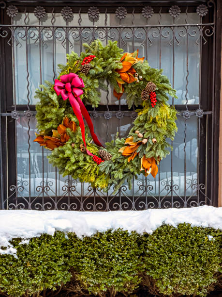 istock Christmas decoration, wreath in window 1447361357