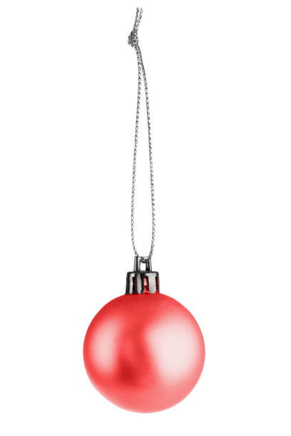 istock shiny Christmas tree ball on a gold thread, Christmas decoration, isolated on a white background 1447362707