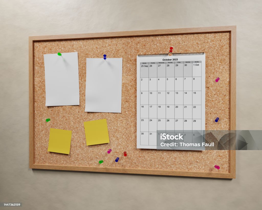 October 2023 Calendar on a cork board Calendar Stock Photo