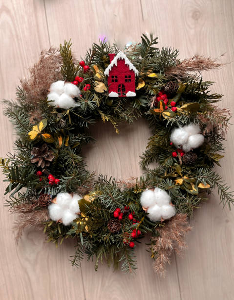 istock Wreath of spruce branches. Decorated with cotton. 1447363359