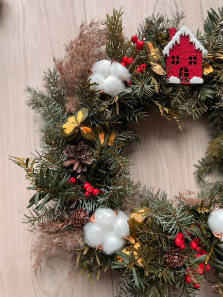 istock Wreath of spruce branches. Decorated with cotton. 1447363360