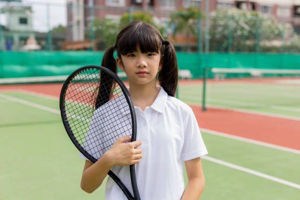 istock Active girl portrait, tennis. 1447364787