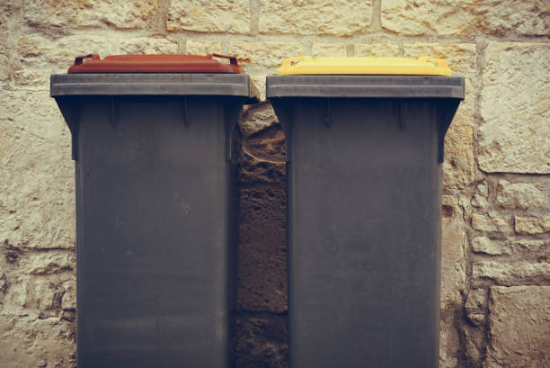 istock Garbage bin or trash can outdoors 1447365080