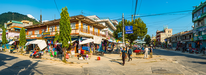 Locals and tourists on the busy streets of Pokhara, Nepal's vibrant second city.