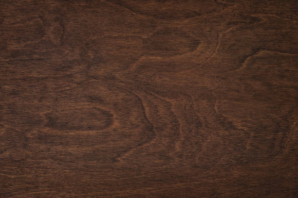 istock brown boards as a template for design. dark wood texture backdrop 1447375883