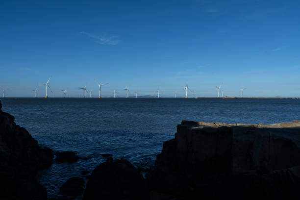 istock Wind power station on the shore rock 1447379444