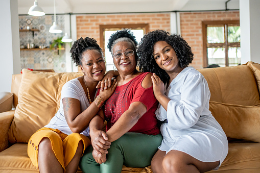istock Portrait of mother with her daughters at Christmas 1447386874