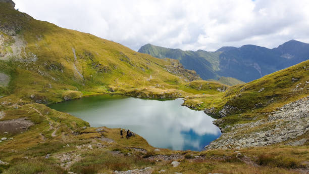 istock Capra Lake, Fagaras Mountains, Romania 1447398711