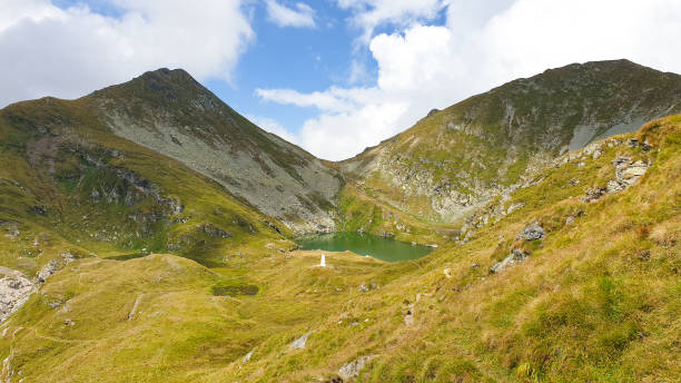 istock Capra Lake, Fagaras Mountains, Romania 1447398728