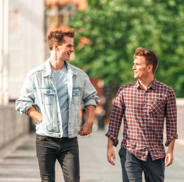 istock Talking as they cross a bridge together 1447400548
