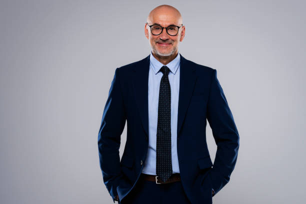 istock Businessman against grey background 1447400733