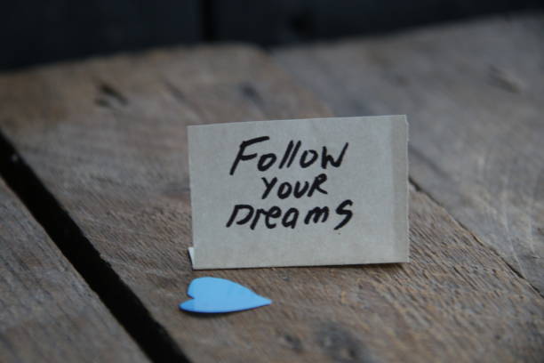 istock Follow your dream text written on a tag. 1447403032