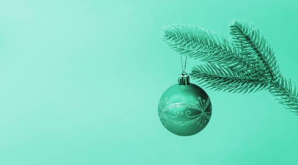 istock Christmas ball toy on xmas tree branch 1447403227