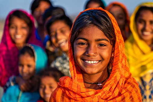 Group of happy Gypsy Indian children - desert village, Thar Desert, Rajasthan, India.