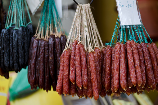 Preserved sausages hanging in street market. Chinese sausages are one of the popular food during Chinese New Year