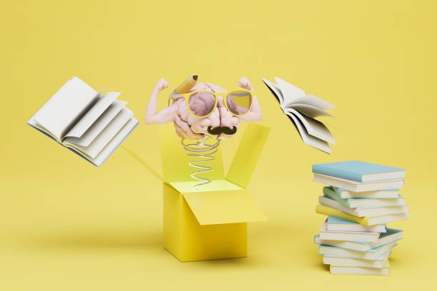 istock the brain is on a spring in an open box around which the books are on a yellow background. 3D render 1447408171