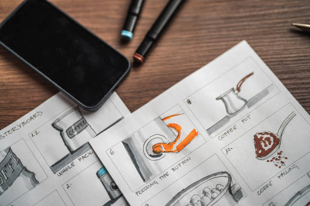 istock Storyboard Editors Table; Colored Pencils And A Smartphone 1447408579