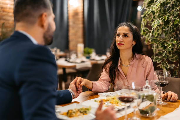 istock Mid Adult Couple Having A Romantic Dinner At The Restaurant 1447408632