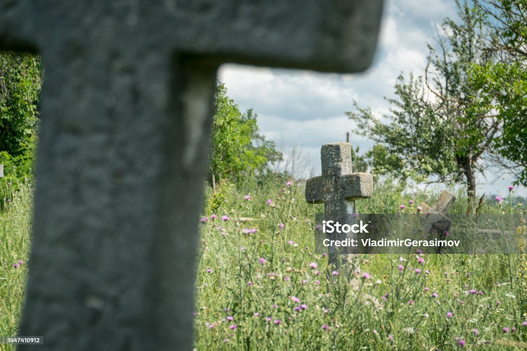 Old abandoned cemetary with burials of the Cossacks in Busha state Historical and Cultural Reserve, located in Busha village on Podillya, Vinnytsa region, Ukraine. Old abandoned cemetary with burials of the Cossacks in Busha state Historical and Cultural Reserve, located in Busha village on Podillya, Vinnytsa region, Ukraine. Travel destinations in Ukraine on  Podillya. Abandoned Stock Photo