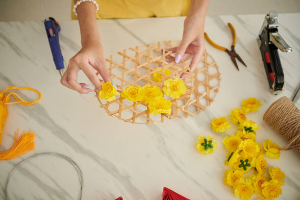 istock Woman Making Festival Decoration 1447411267