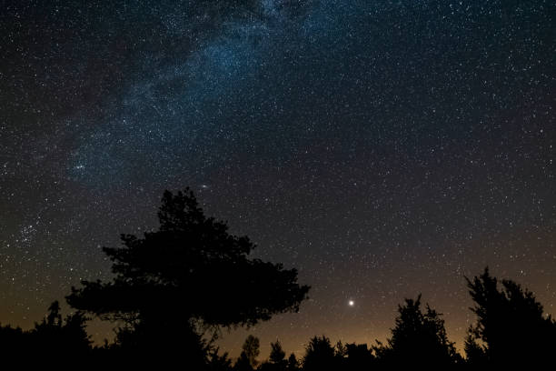 istock Starry sky, Milky Way, Andromeda galaxy, seen from Earth. 1447412509