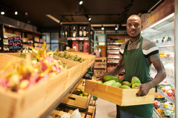 istock Worker of Produce Department 1447414886